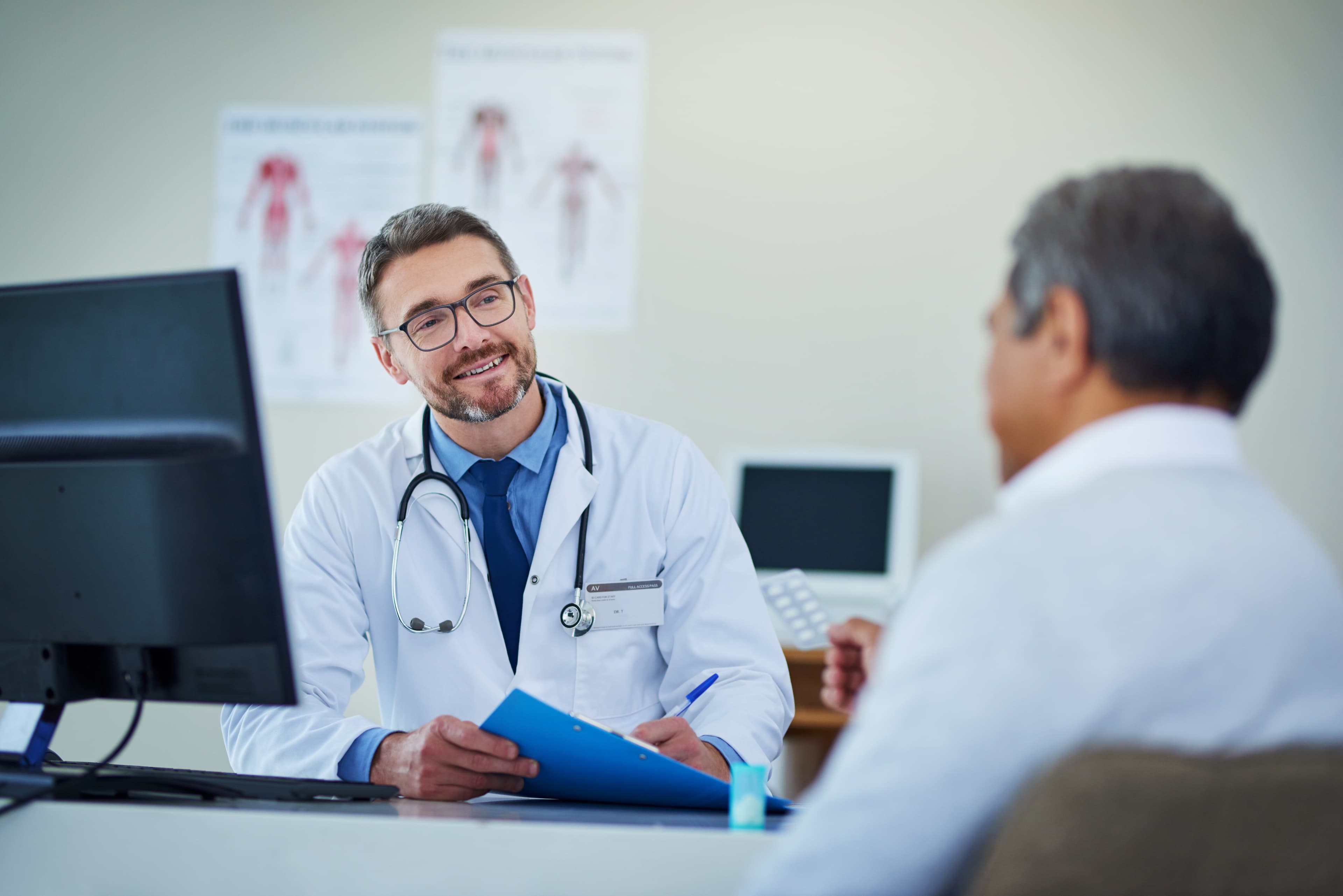 Doctor consulting with patient